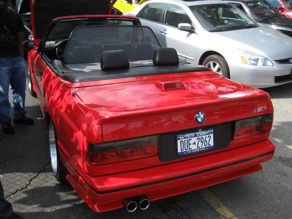 It does look weird with the spoiler, besides, the BMW never put the spoiler on e30 m3 cabriolet