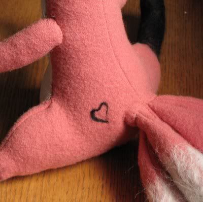 I needle felted a little heart tattoo on its bum!