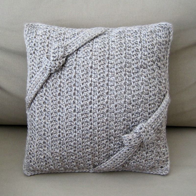 The Lodge Pillow: crochet pillow with knotted straps | She's Got the Notion