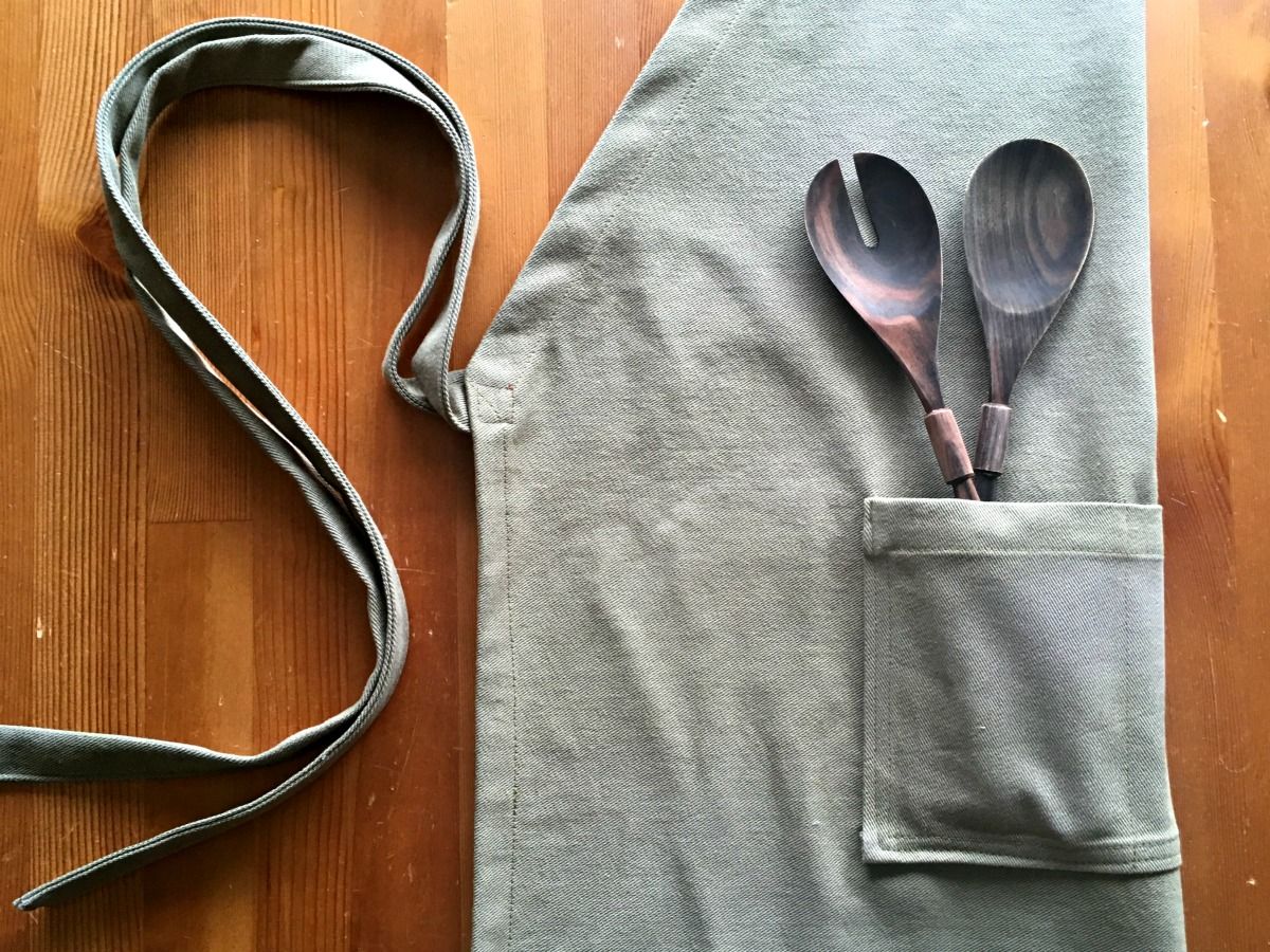 Men's Apron Sewing Tutorial: how to sew an apron for guys with a decorative faux leather strap. Perfect for cooking, bbq, and as a utility apron. Includes cutting dimensions. Makes a great gift! | She's Got the Notion
