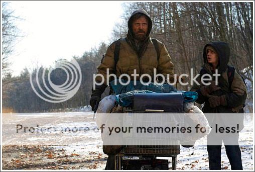Viggo Mortensen (The Man) and Kodi Smit-McPhee (The Boy) travel with their grocery cart in a scene from The Road. ©2009 Dimension Films, all rights reserved.